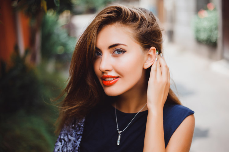 woman smiling displaying lips